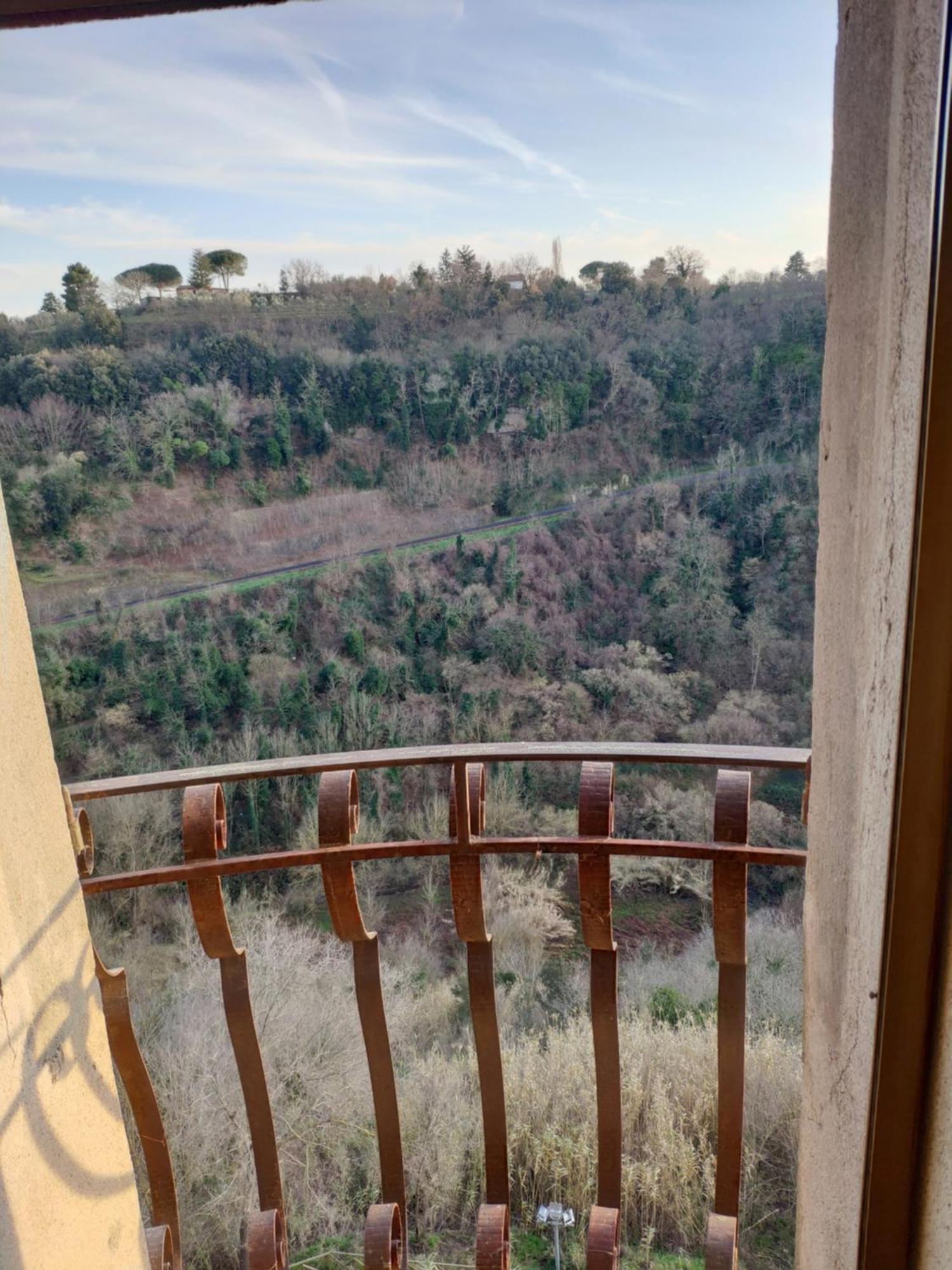 Apartamento Dimora Della Rupe Pitigliano Habitación foto